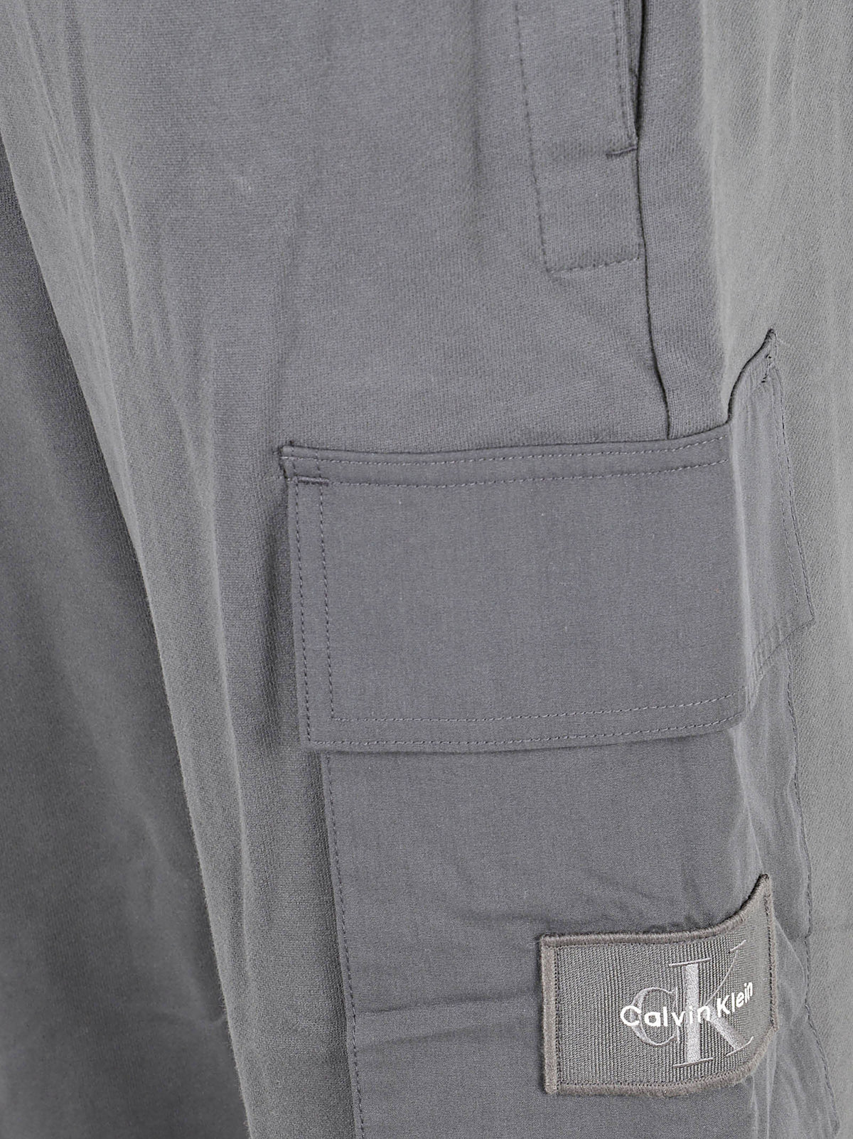 PANTALONE TUTA UOMO EU350TERRY BADGE - CALVIN KLEIN JEANS<BR/> LV04RJ204G 8MN PIRATE BLACK CALVIN KLEIN 