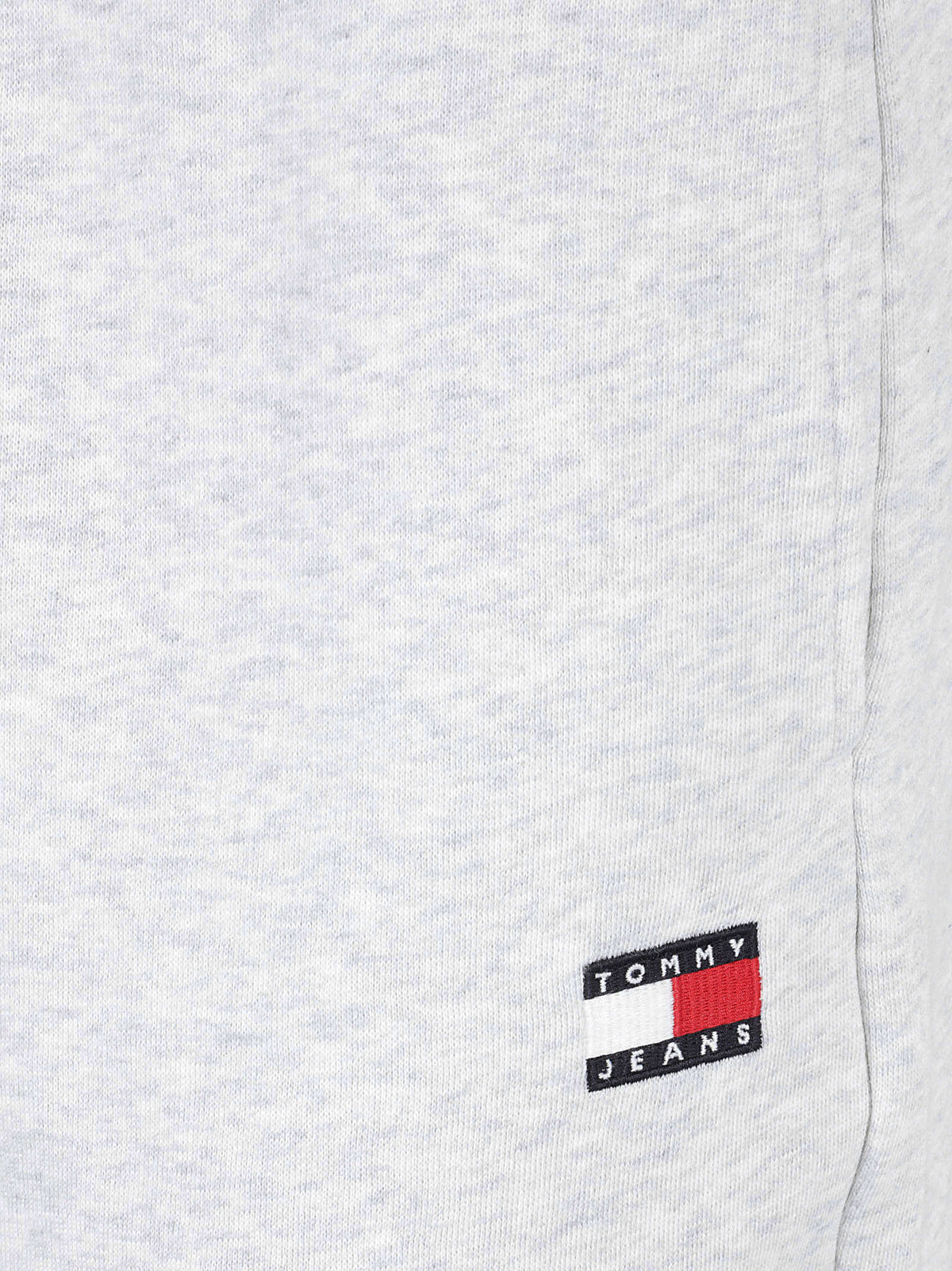 PANTALONE TUTA UOMO REG BADGE - TOMMY JEANS<BR/> DM0DM23729 P08 ICE GREY HEATHER TOMMY HILFIGER 