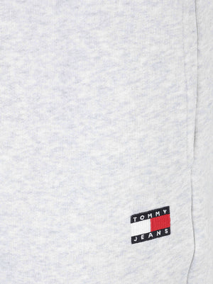 PANTALONE TUTA UOMO REG BADGE - TOMMY JEANS<BR/> DM0DM23729 P08 ICE GREY HEATHER TOMMY HILFIGER 